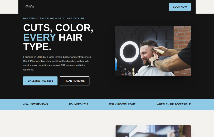 Barbershop website concept, near-black and ice-blue palette